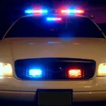 Police investigate a fatal two-vehicle crash at a rural McLean County intersection