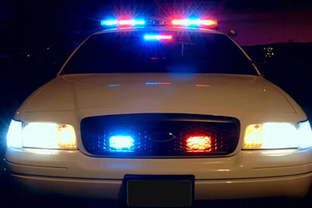 Police investigate a fatal two-vehicle crash at a rural McLean County intersection