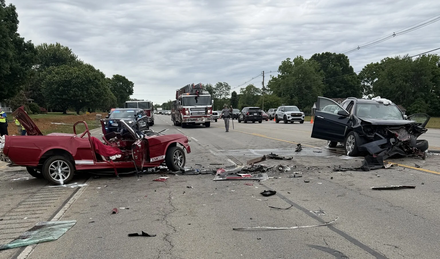 Police investigate a fatal two-vehicle crash on a Kentucky roadway near Bardstown