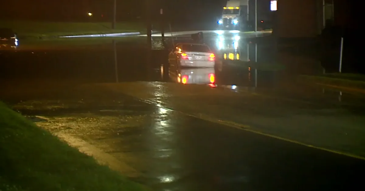Floodwater covers a roadway after overnight storms in the Tri-State area