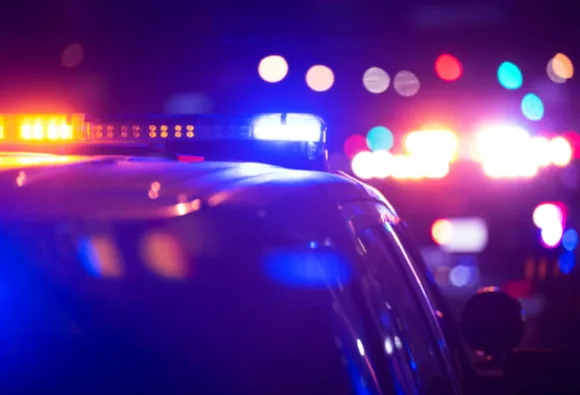Police vehicles and flashing lights during a law enforcement investigation in Sikeston, Missouri