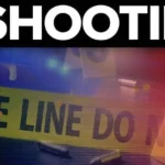 Police investigate the area near Douglass Park in Columbia after a July shooting