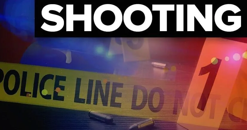 Police investigate the area near Douglass Park in Columbia after a July shooting