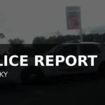 A Kentucky State Police cruiser parked beside a roadside traffic checkpoint